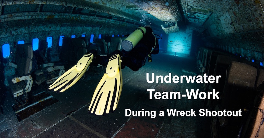 a scuba diver swims inside a plane wreck